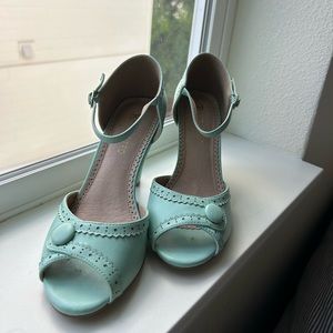 Mint blue peep toe pumps